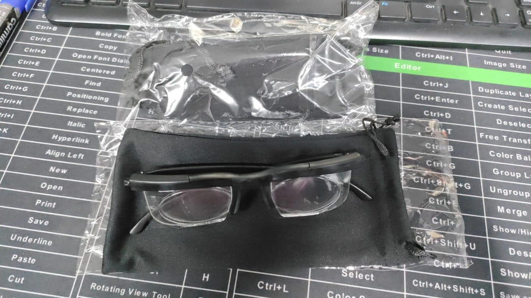 ADJUSTABLE FOCUS GLASSES FOR NEAR AND FAR SIGHT